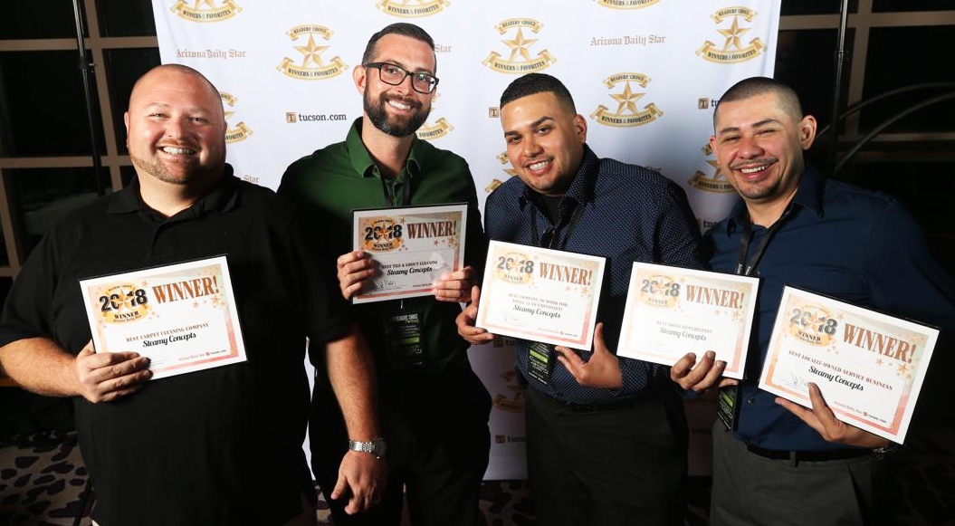 Steamy Concepts Staff Holding Arizona Daily Stars Readers Choice Awards 2018